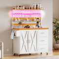 DWVO Farmhouse Bakers Rack with Power Outlet and LED Light, 53 inch Coffee Bar Cabinet Station with Storage, Microwave Stand on Wheels, with Wine Racks, Shelves, Goblet Holder and 14-S Hooks (White)